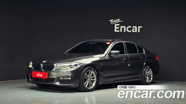 BMW 5 Series — фото 1