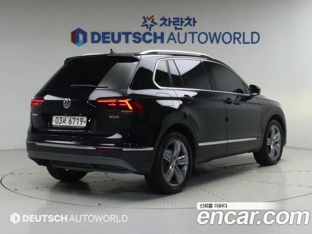 Volkswagen Tiguan — фото 1