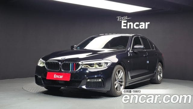 BMW 5 Series — фото 1