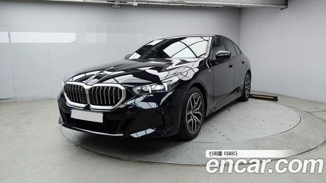 BMW 5 Series — фото 1