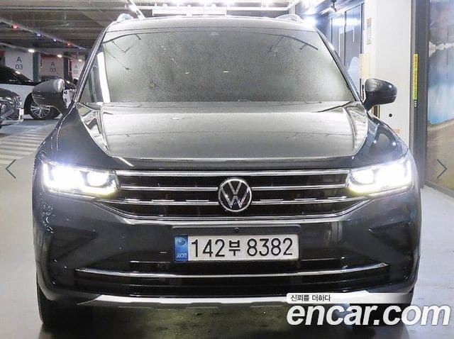 Volkswagen Tiguan — фото 1