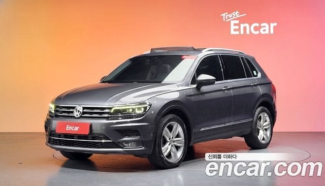 Volkswagen Tiguan — фото 1