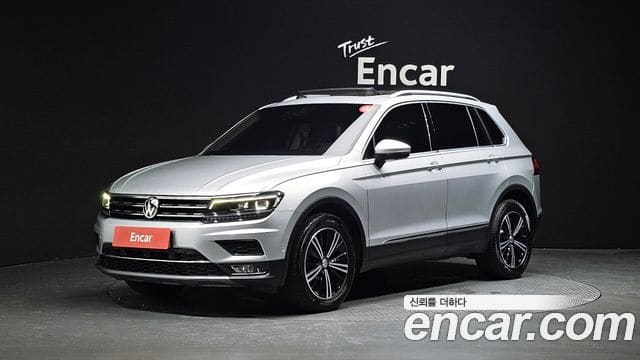 Volkswagen Tiguan — фото 1