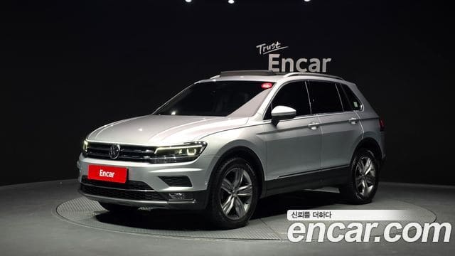 Volkswagen Tiguan — фото 1