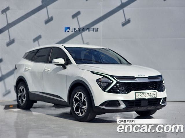 Kia Sportage — фото 1