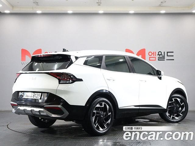 Kia Sportage — фото 1