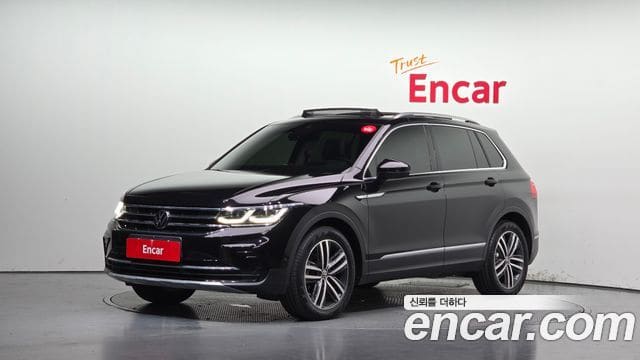 Volkswagen Tiguan — фото 1