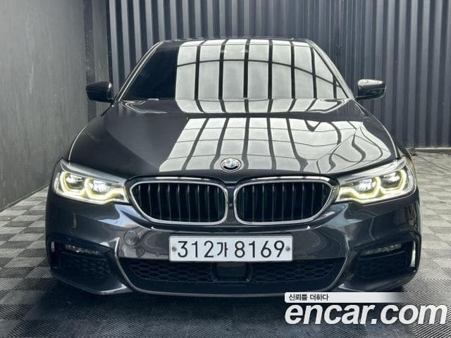 BMW 5 Series — фото 1