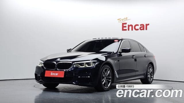 BMW 5 Series — фото 1
