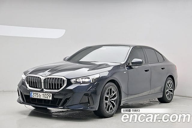 BMW 5 Series — фото 1