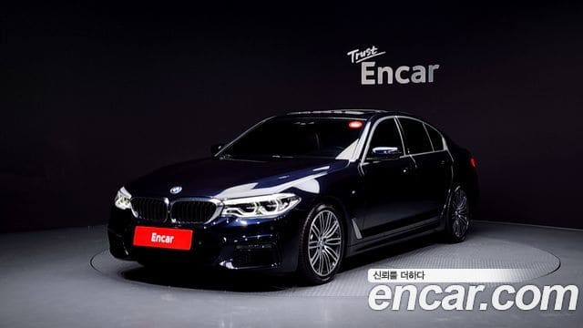 BMW 5 Series — фото 1
