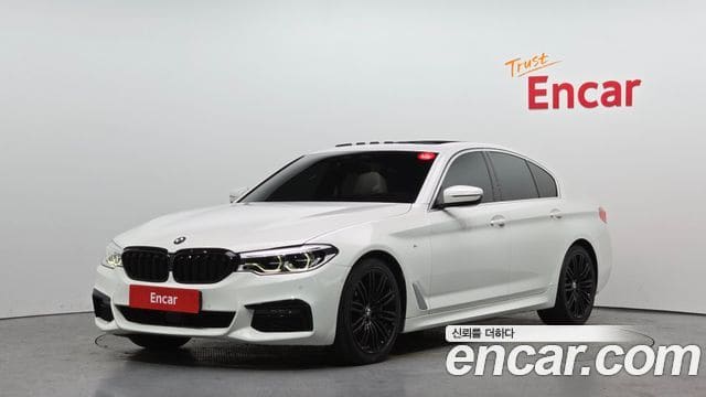 BMW 5 Series — фото 1