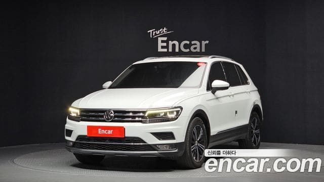 Volkswagen Tiguan — фото 1