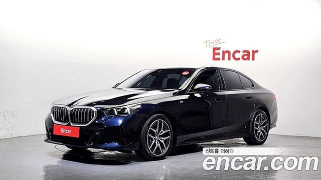 BMW 5 Series — фото 1