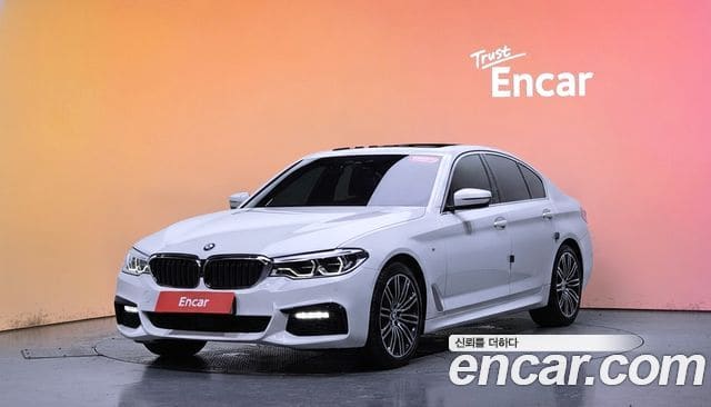 BMW 5 Series — фото 1