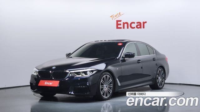 BMW 5 Series — фото 1