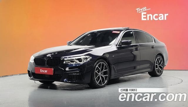 BMW 5 Series — фото 1