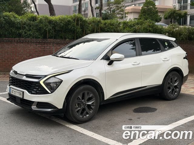 Kia Sportage — фото 1