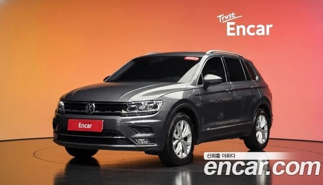 Volkswagen Tiguan — фото 1
