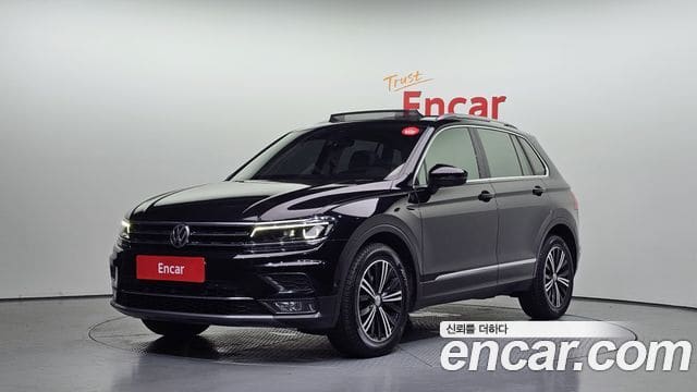 Volkswagen Tiguan — фото 1