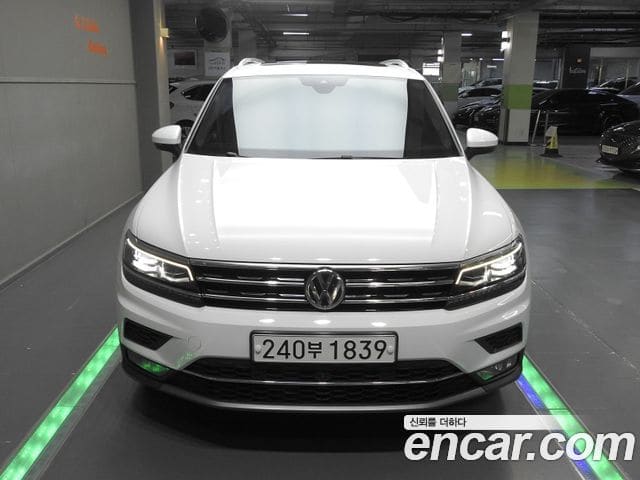 Volkswagen Tiguan — фото 1