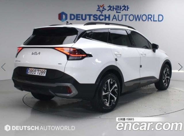 Kia Sportage — фото 1