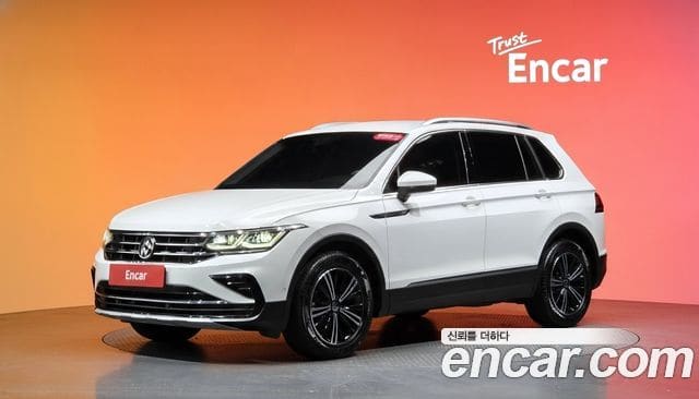 Volkswagen Tiguan — фото 1