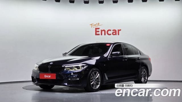 BMW 5 Series — фото 1