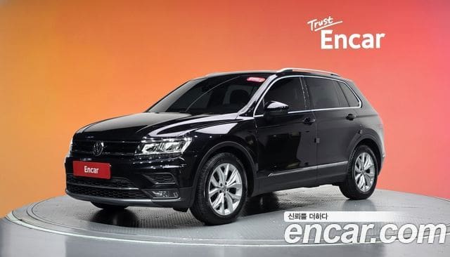 Volkswagen Tiguan — фото 1