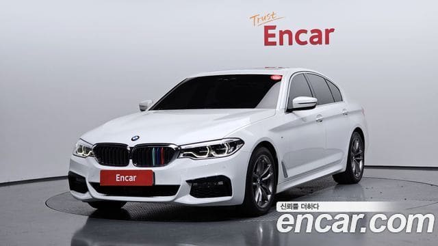 BMW 5 Series — фото 1