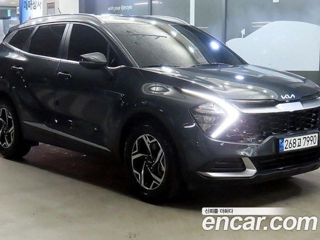 Kia Sportage — фото 1