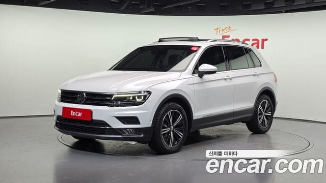 Volkswagen Tiguan — фото 1