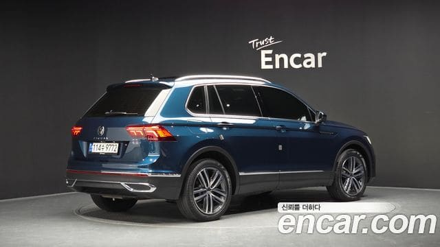 Volkswagen Tiguan — фото 1