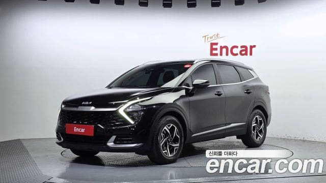 Kia Sportage — фото 1