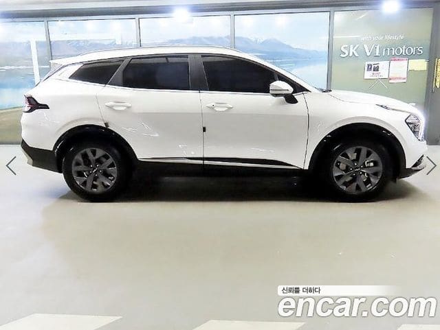 Kia Sportage — фото 1