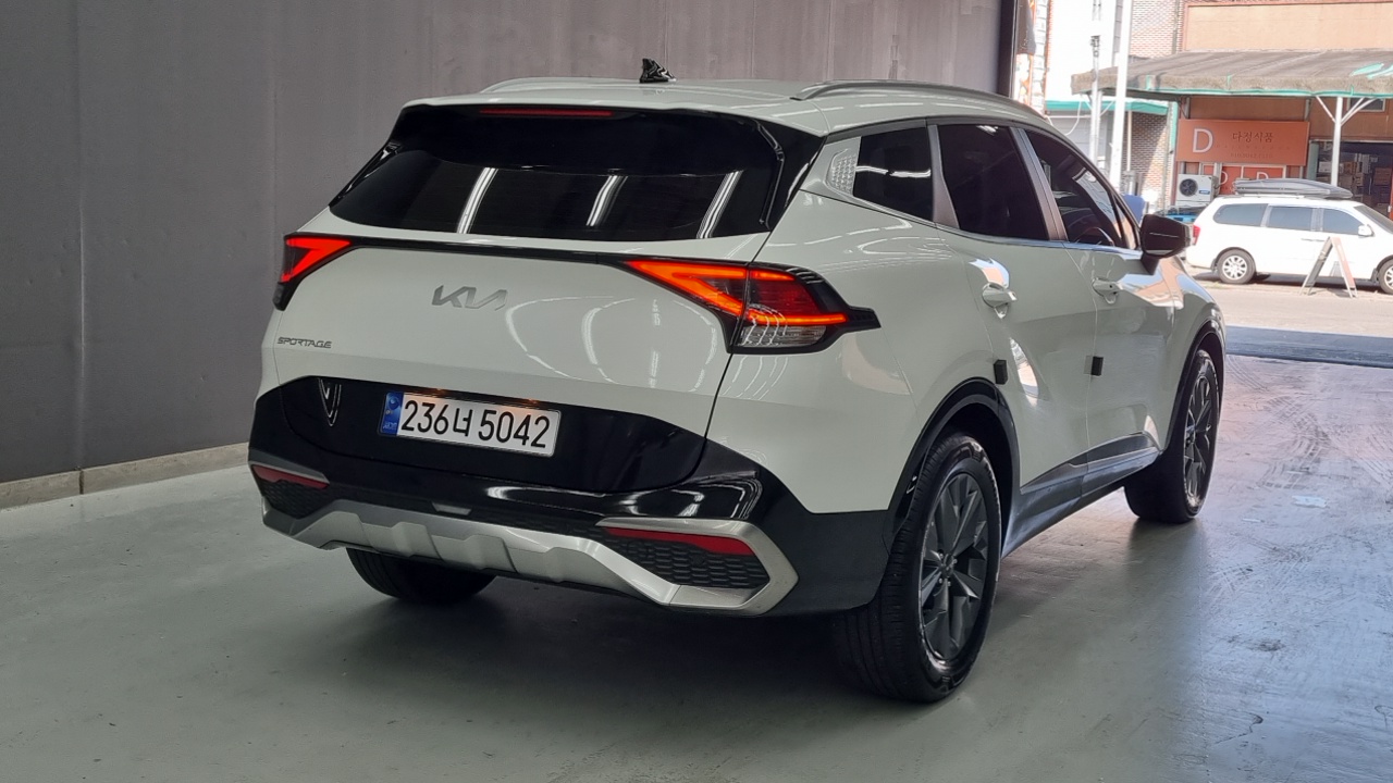 Kia Sportage — фото 1