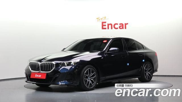 BMW 5 Series — фото 1