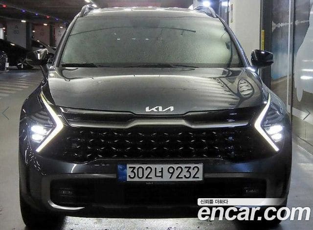 Kia Sportage — фото 1