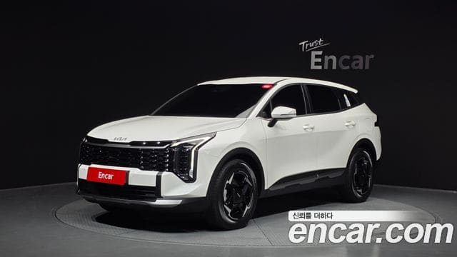 Kia Sportage — фото 1