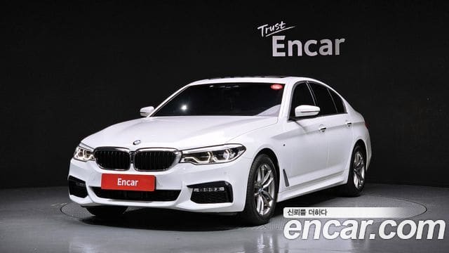 BMW 5 Series — фото 1