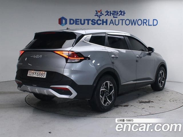 Kia Sportage — фото 1
