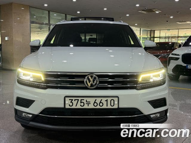 Volkswagen Tiguan — фото 1