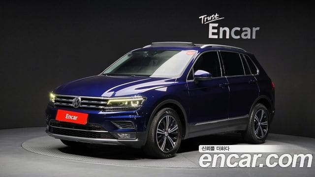 Volkswagen Tiguan — фото 1