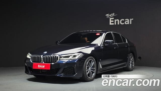 BMW 5 Series — фото 1