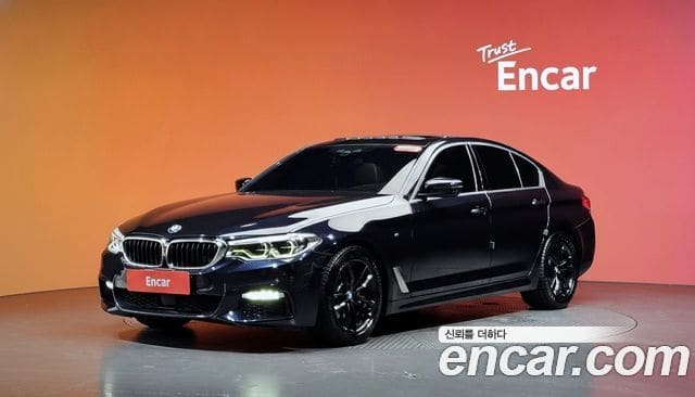 BMW 5 Series — фото 1