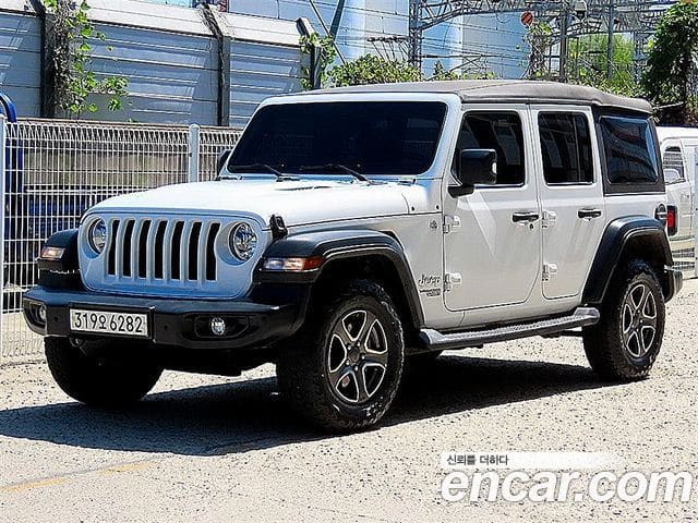Jeep Wrangler — фото 1