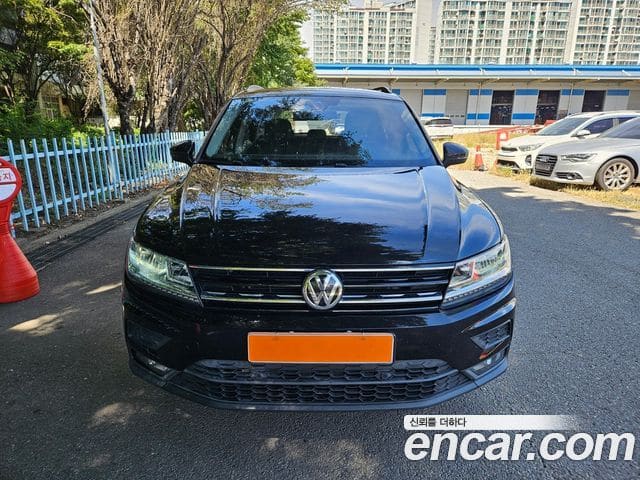 Volkswagen Tiguan — фото 1