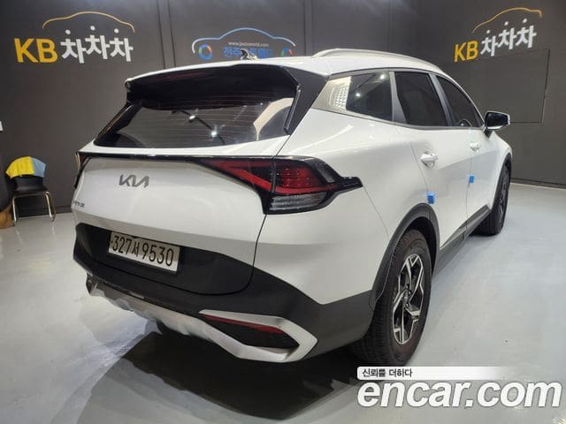 Kia Sportage — фото 1
