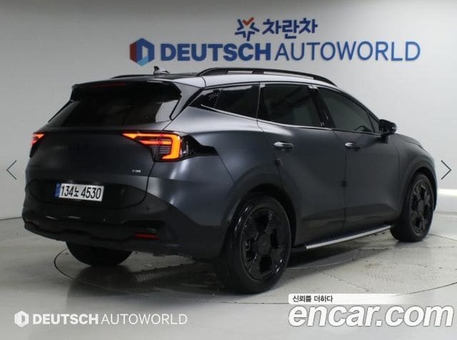 Kia Sportage — фото 1