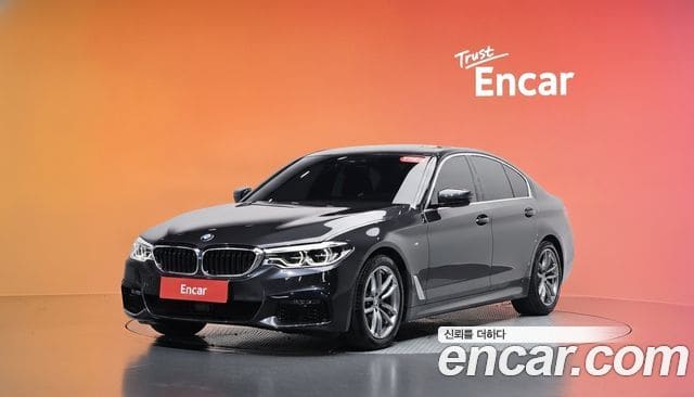 BMW 5 Series — фото 1